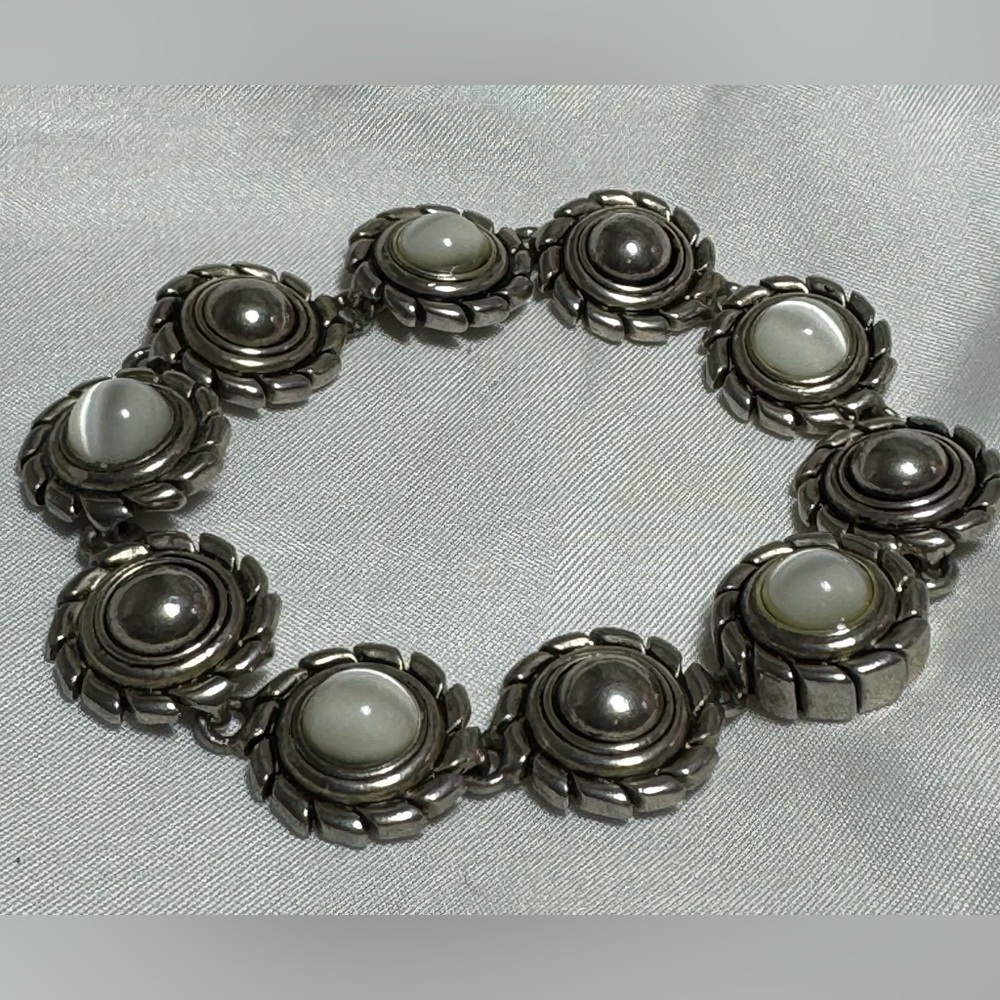 Silver Toned Bracelet with White Cat Eye Stones‎